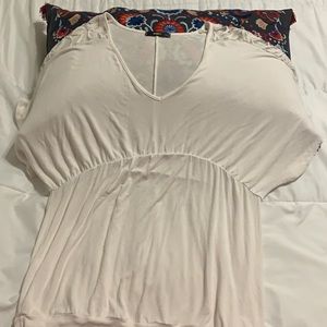 Beautiful cream colored top with lace on sleeves